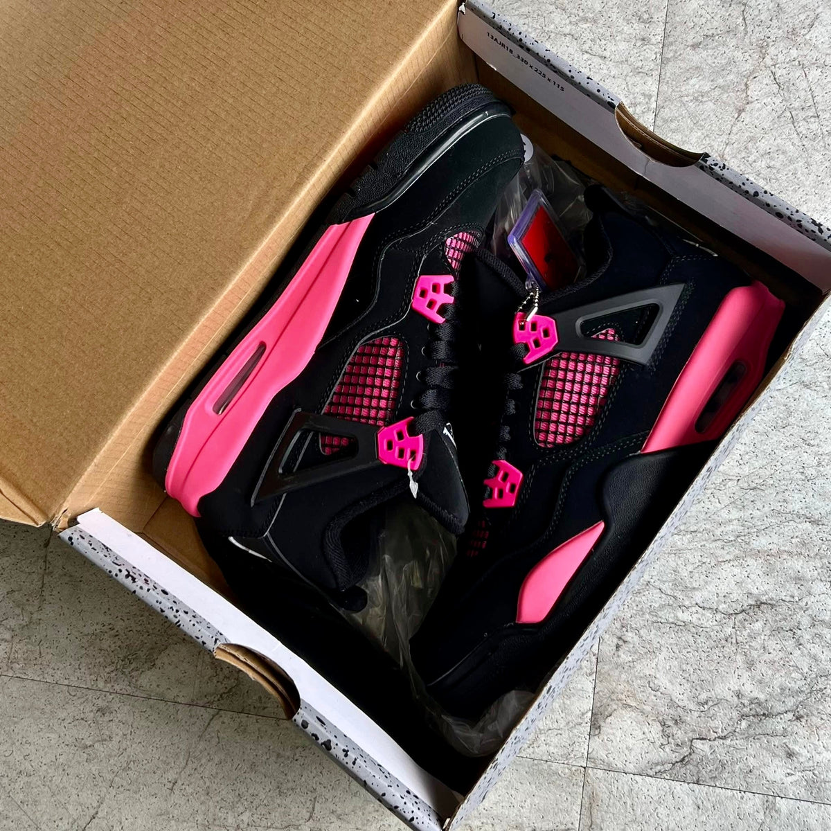 Nike Air Jordan 4 "Pink Thunder"
